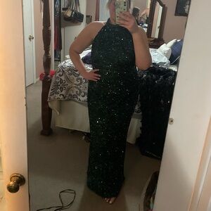 Geeen sequin dress with low back and high neck line
